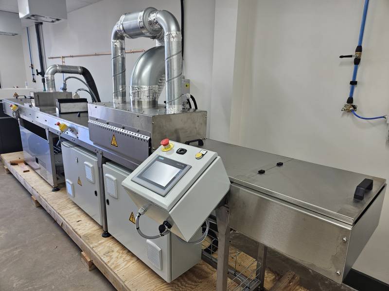 Infrared and UV testing conveyor system in Sweden