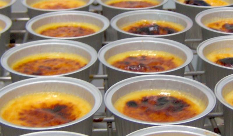 Browning of crème brulée in an industrial electric medium wave infrared tunnel